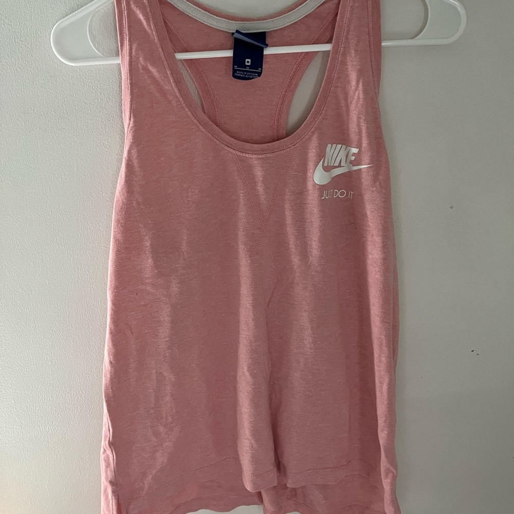 2 for 24$ NEVER WORN. Nike tank tops